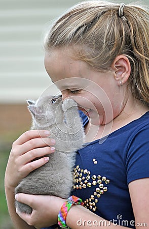 Little girl gets bite on nose from new pet kitten