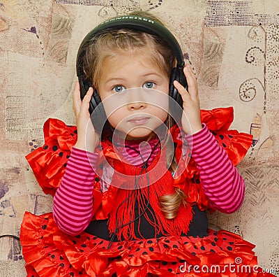 Little girl with headphones