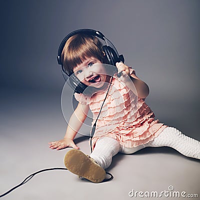 Little girl with headphones