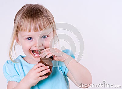 Little Girl and Her Chocolate Easter Bunny