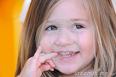 http://thumbs.dreamstime.com/x/little-girl-looking-away-smile-6062241.jpg