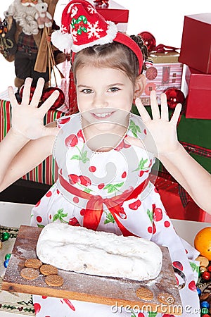 Little girl making Christmas cake