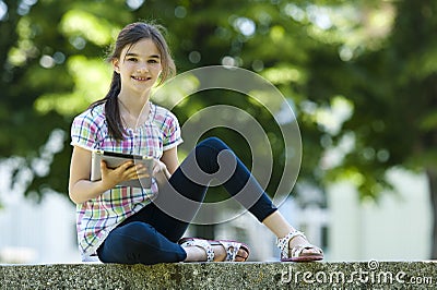 Little girl with PC tablet