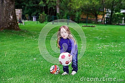 Little girl playing with ball