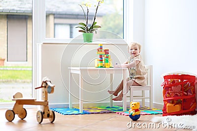 Little girl playing indoors