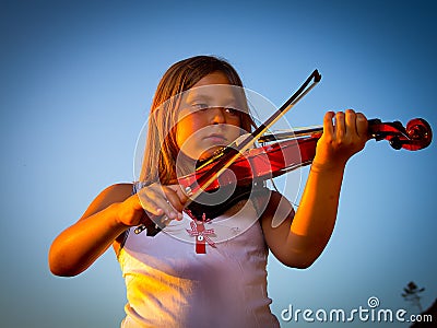 Little girl playing violin