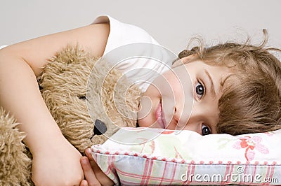 Little girl with teddy bear