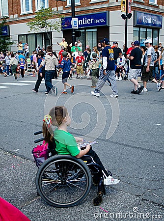 Parade watcher in wheelchair