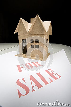 Little House with For Sale Sign