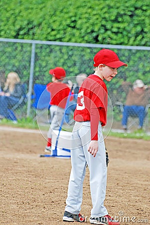 Little league baseball player.