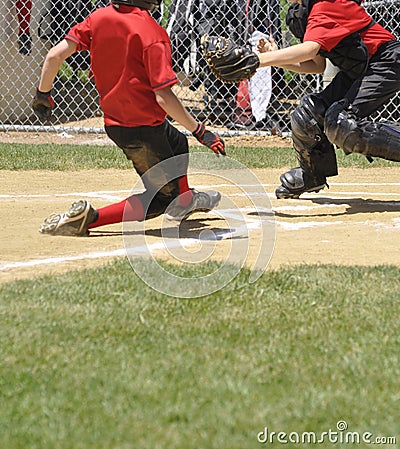 Little league play at homeplate