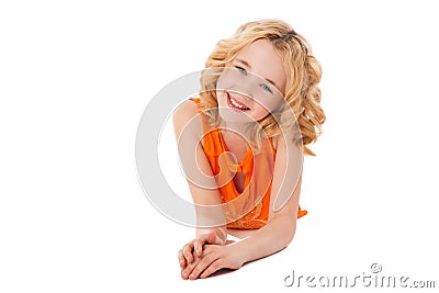 Little smiling girl in orange clothes