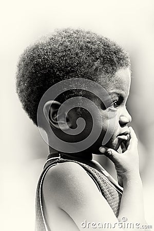 Little thinking boy from Ghana