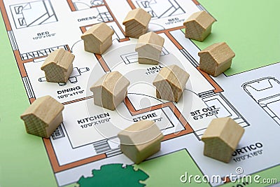 Little wood houses on a plan