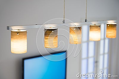 Living room with flat TV and chandelier