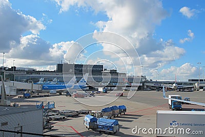 LM plane being loaded at Schiphol Airport