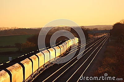 Loaded coal train in evening sunlight near York