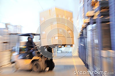 Loader in a warehouse