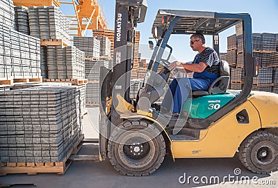Loading footwalk products at construction factory