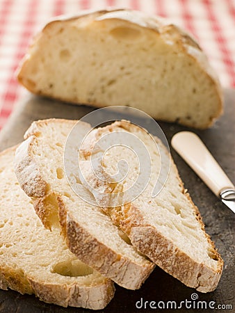 Loaf and Slices of American Sour Dough Bread