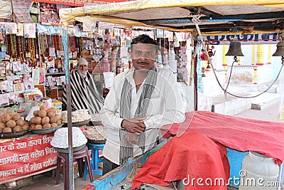 A local ice cream vendor with his push cart