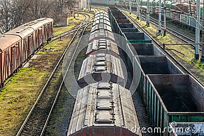 The locomotive drags freight cars