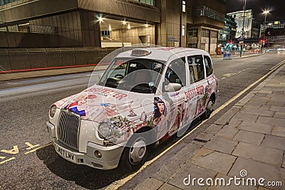 London Taxi Cab with advertising paintwork