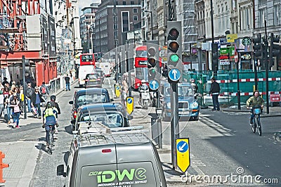 London traffic, buses, bikes, taxis and cyclists