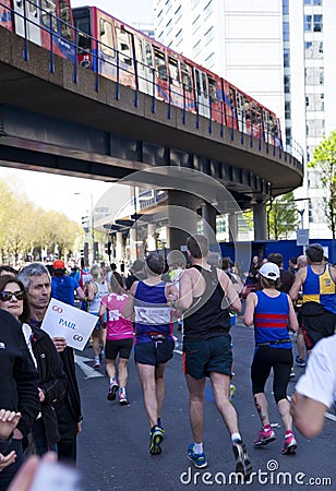 LONDON, UK - APRIL 13, 2014 - London Marathon in Canary Wharf aria, massive sport event for professionals and amateurs sportsmen,