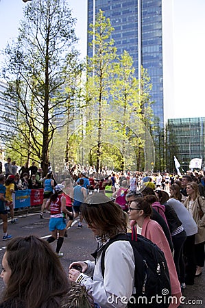 LONDON, UK - APRIL 13, 2014 - London Marathon in Canary Wharf aria, massive sport event for professionals and amateurs sportsmen,