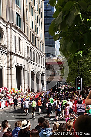 LONDON, UK - APRIL 13, 2014 - London Marathon in Canary Wharf aria, massive sport event for professionals and amateurs sportsmen,