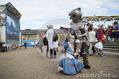 LONDON, UK - OCTOBER 26: Cosplayers dressed as Big Daddy and Lit