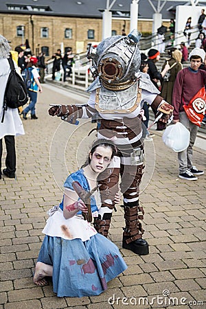 LONDON, UK - OCTOBER 26: Cosplayers dressed as Big Daddy and Lit