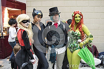 LONDON, UK - OCTOBER 26: Cosplayers dressed as a Harley Quinn,