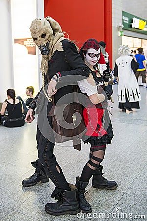 LONDON, UK - OCTOBER 26: Cosplayers dressed as a Harley Quinn a
