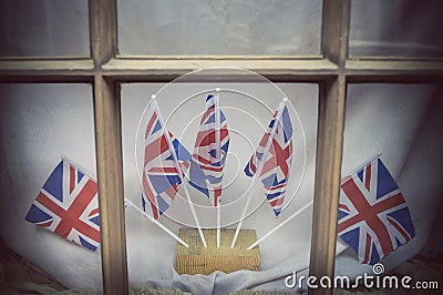 London window decorated with Union Jacks