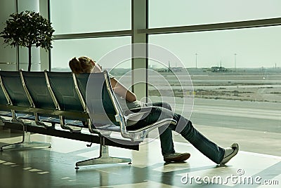 Lonely girl waiting in airport