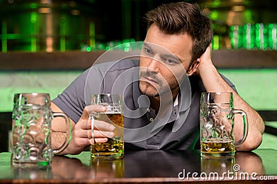 Lonely man in bar.