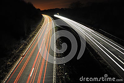 Long shutter speed of cars lights on road