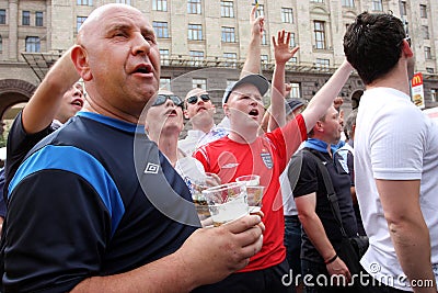 Loud english football fans have fun and beer