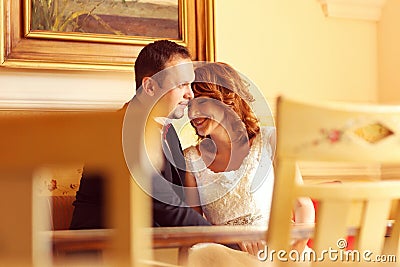 Lovely bride and groom in a beautiful room