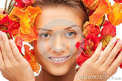 Lovely woman with red flowers