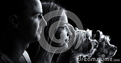 Loving couple and two yorkshire terrier dogs -Black and white