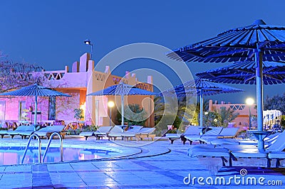 Luxurious swimming pool at night