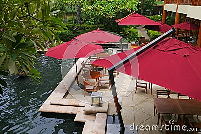 Luxury bar with red parasols