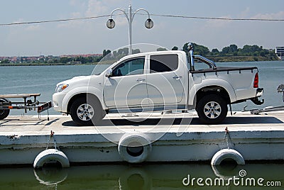 Luxury car on ferry boat