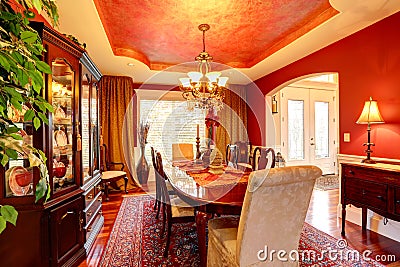 Luxury dining room in bright red colors