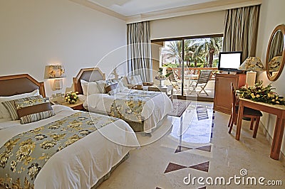Luxury hotel bedroom with sea view