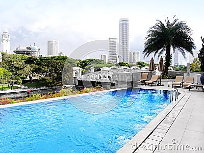 Luxury hotel pool, city view