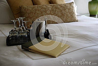 Luxury Hotel Room Bed with Drinks Tray and Menu